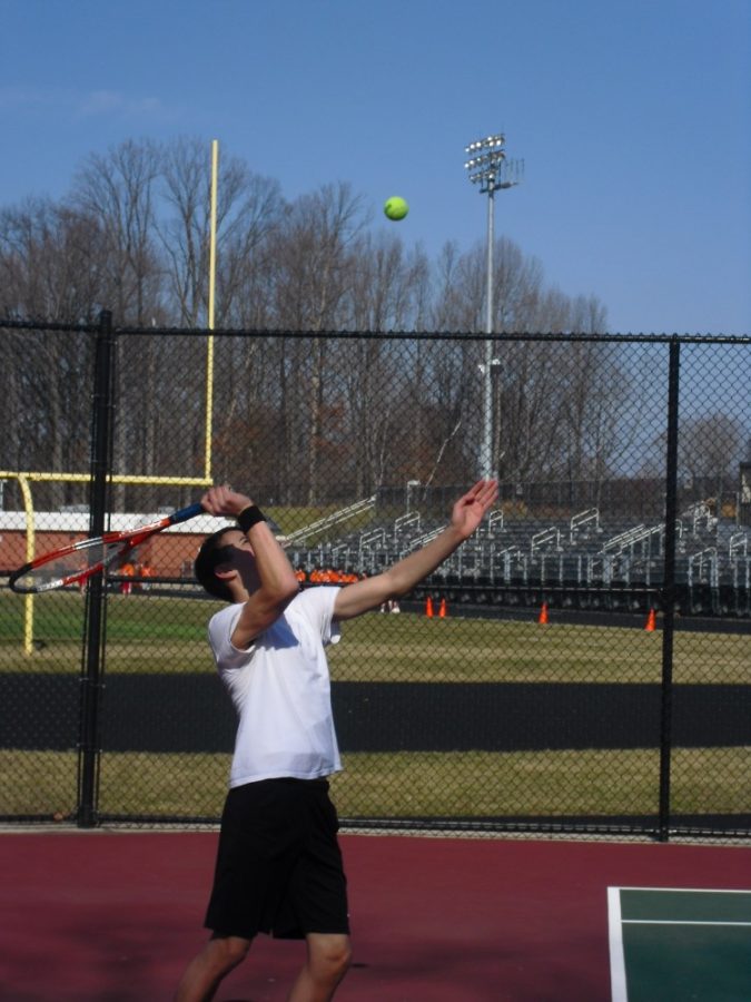 Tennis players begin to prepare for their first divisional game on March 25. -- Pat Aiamsubhab