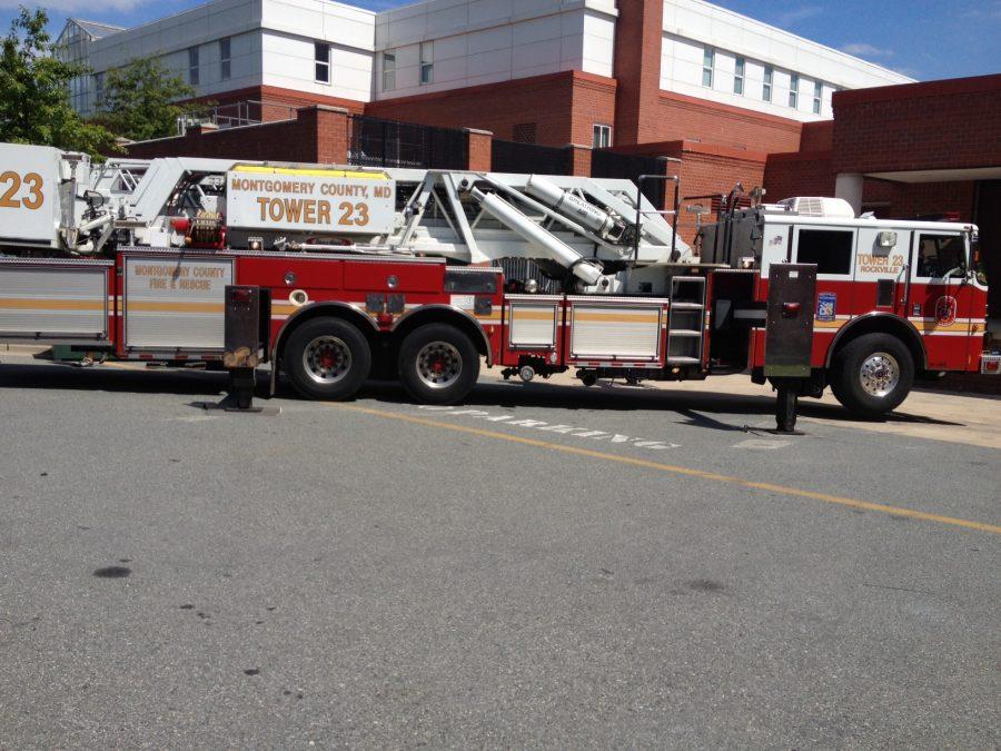 Firefighters arrive on scene at RHS Monday afternoon after smoke emitted from an engineering classroom. -- Layla Eshack