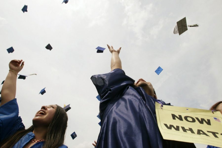 Students including Xavier Marquez, 16, right, and Brenda, 16, (last name withheld), originally from Mexico and a student at of Horlick High School in Racine, Wisconsin, throw their caps sky high during a United We Dream! Commencement Ceremony, on the west lawn of the U.S. Capitol building in Washington, D.C., on Tuesday, April 20, 2004.  --Courtesy of MCT Campus