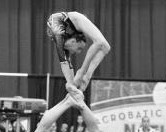 Kirschner climbs on her partners as the trio perfoms a ring handstand at the 2012 acrobatic gymnastics nationals in Detroit. Courtesy of Champion League