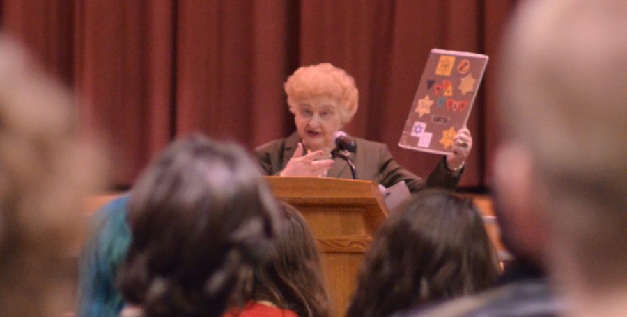 Holocaust+survivor+Nesse+Godin+talks+to+RHS+students+during+the+Portraits+of+Life+assembly.+In+1941%2C+Godin+was+taken+from+her+home%2C+put+in+a+concentration+camp+and+separated+from+her+parents.+--Adam+Bensimhon