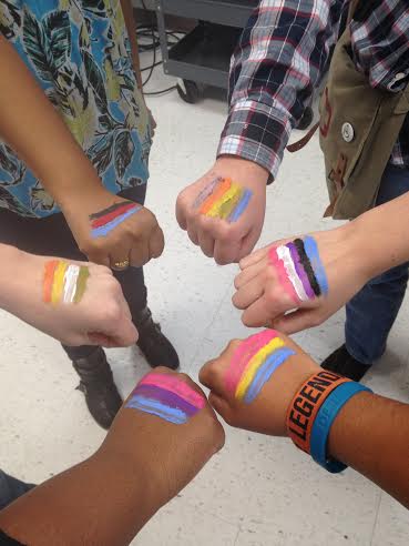 Students showing solidarity and recognition of their ignored sexual, romantic, and gender identities, by painting their respective flags on their hands. --Melanie Atzili
