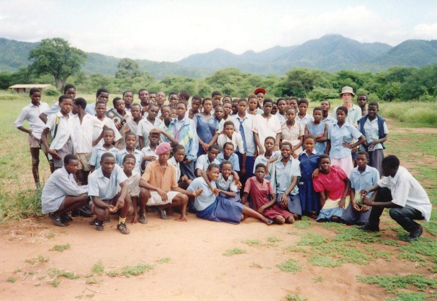 Mark Bradley poses with high school students while serving in Zimbabwe.
Photo Courtesy of Mark Bradley