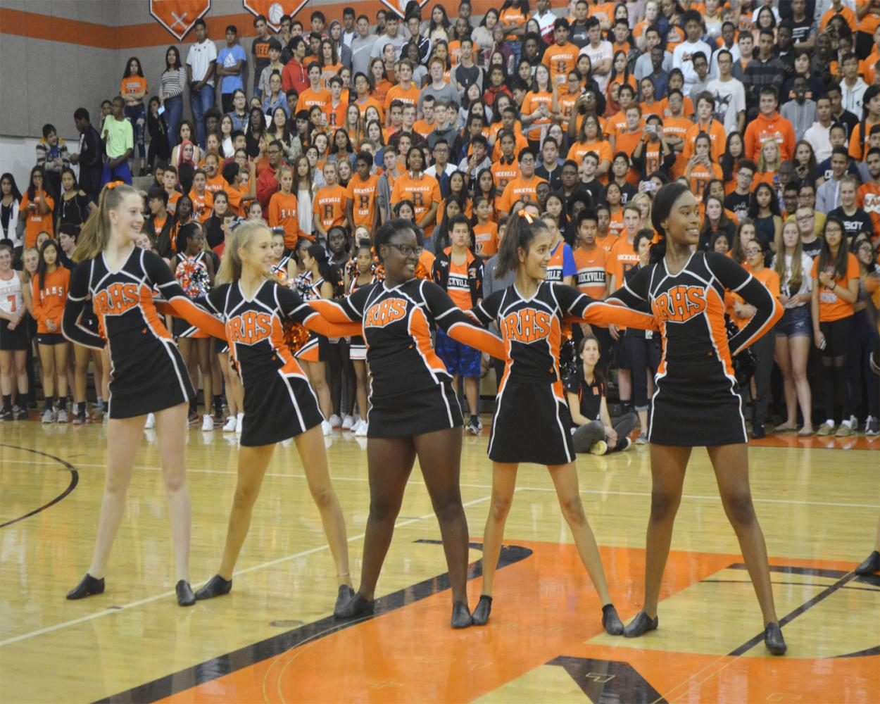 Poms perform at the pep rally.