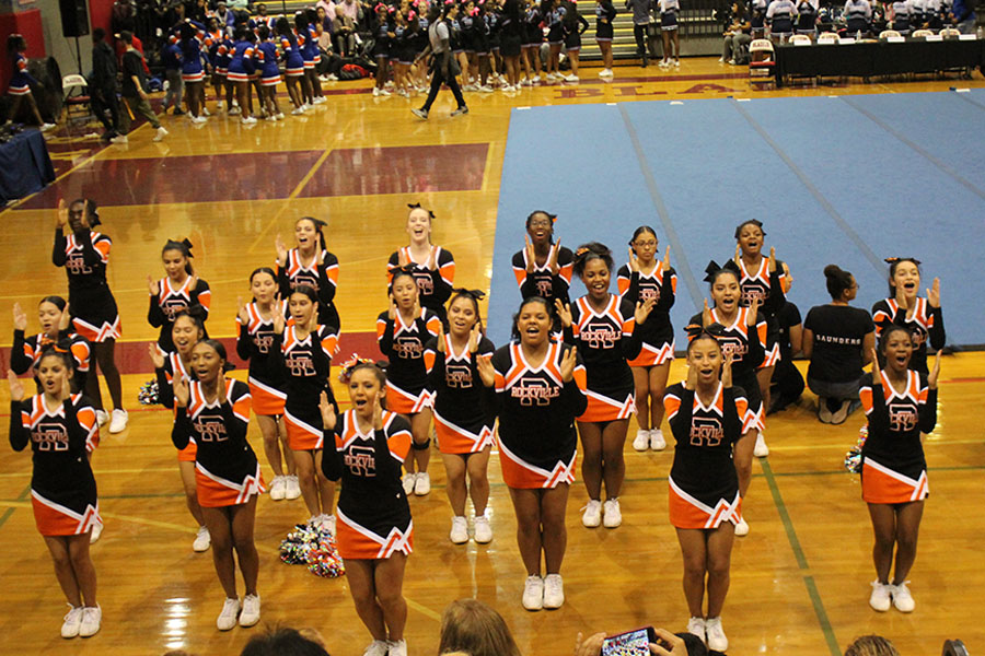 Varsity cheer performed at the Division Three Cheerleading Competition Oct. 26 at Montgomery Blair HS where they placed fourth.
