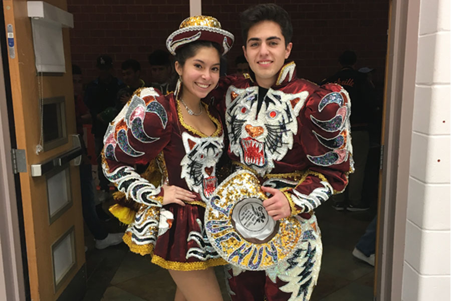 El presidente del club de la directiva Hispana senior Bella Bethancourt y un senior de Richard Montgomery HS Gabriel Verlarde bailaban durante la Noche Latina Dec. 13.