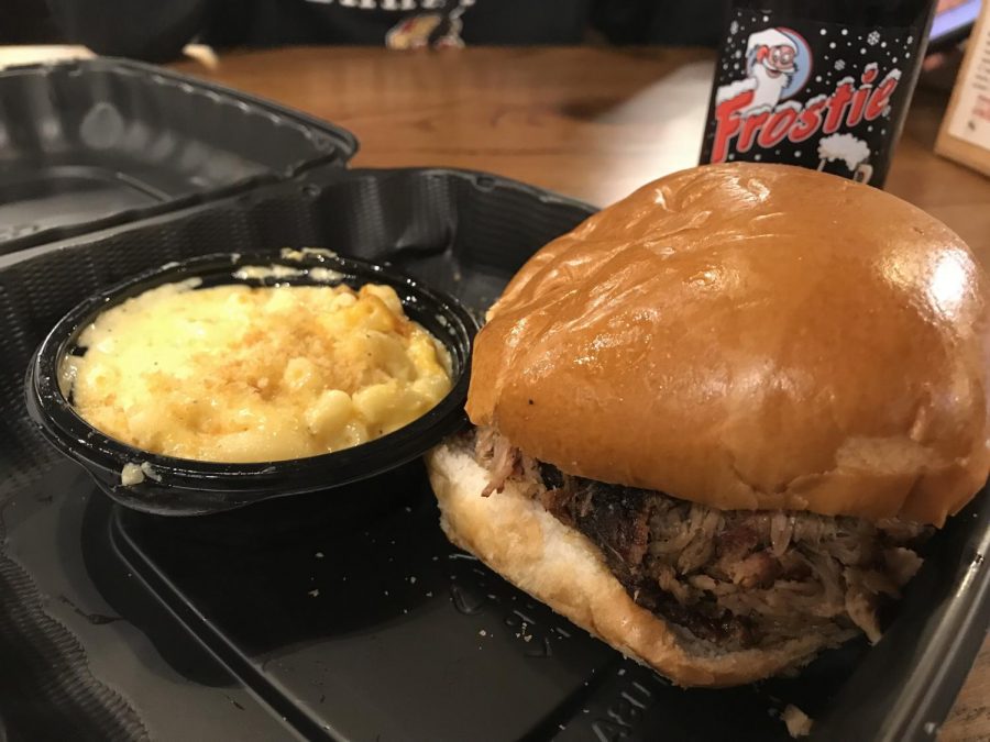 Pictured+is+Mission+BBQ%E2%80%99s+pulled+pork+sandwich+with+a+side+of+macaroni+and+cheese.+Their+sandwich+combination+comes+with+a+drink+and+two+sides%2C+and+totals+up+to+approximately+%2411.+
