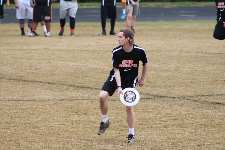 Junior Captian Connor Shields looks to huck the disk down the field to give the opposing team their possession.  