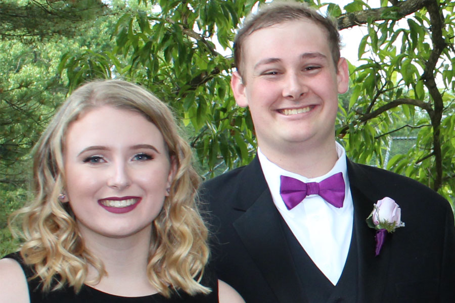 Longtime girlfriend Alicia O’Neil (‘17) poses with David Robbins (‘17) before prom last year, May 19, 2017, where they won prom king and queen. Robbins passed away Nov. 30, 2017.