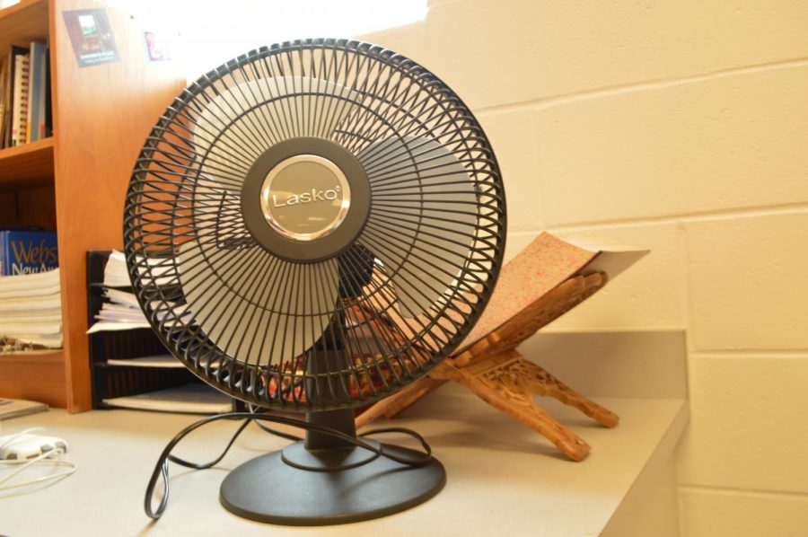 Portable fans become a necessity for classrooms that suffer the most from the broken heat system.