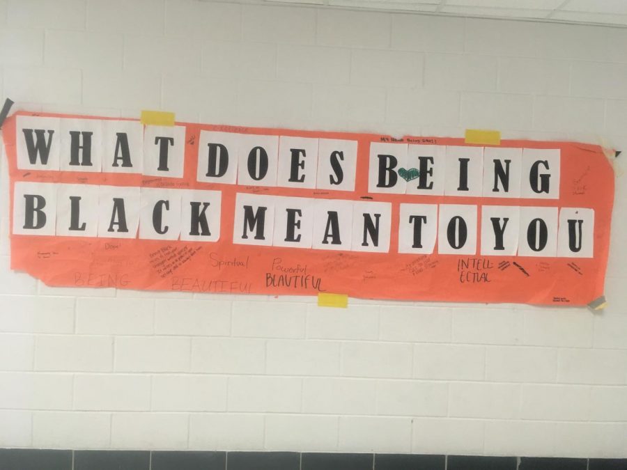 Sign in the second floor hallway with responses by students at RHS. 