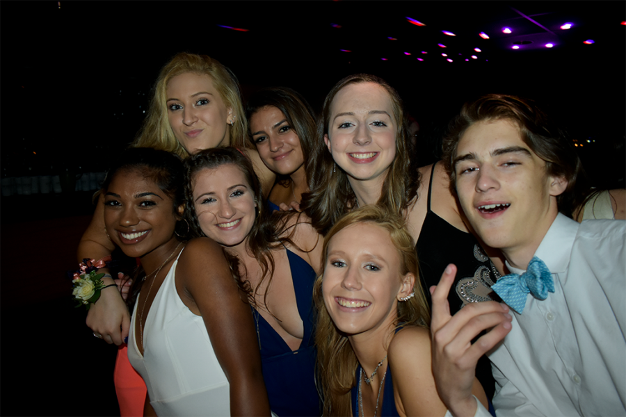 Students head to the dance floor after finishing the meal portion of the night on the “Spirit of Baltimore” boat.