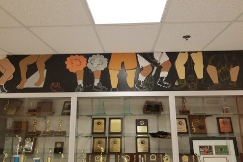 National Art Honor Society Designs, Paints Athlete Mural Over Trophy Case