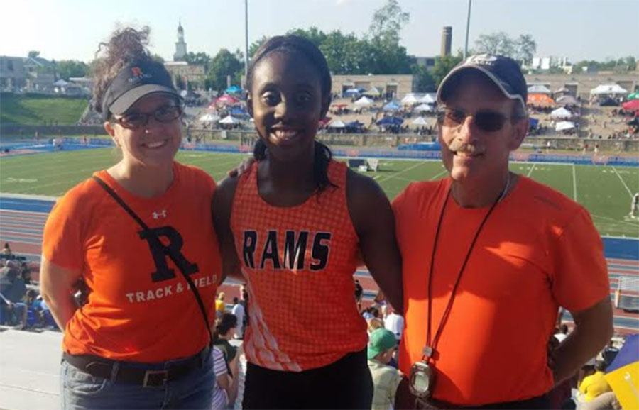 Wong (center) ran May 25 at the States Track Meet accompanied by both coaches and was the only RHS track athlete to compete.