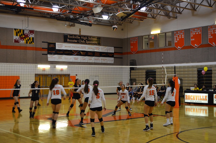 Junior Elenna Mach sets up the ball as the Rams go on offense against the Poolesville Falcons. Despite the straight set loss, fans came out to support Lily's Hope.
