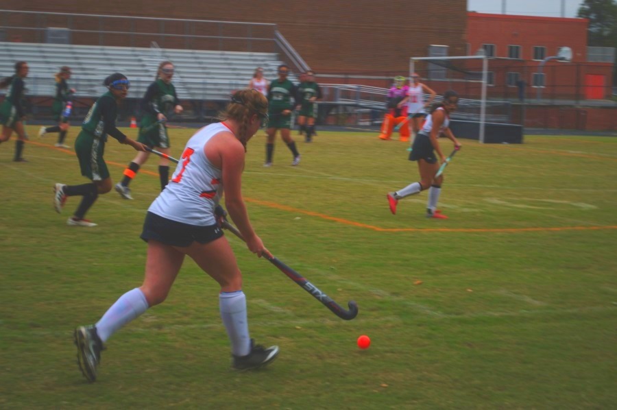 Junior Kaelyn Mashburn approaches the Kennedy Cavaliers defense in one of many offensive efforts, resulting in the Rams 4-0 playoff victory at home Oct. 25.