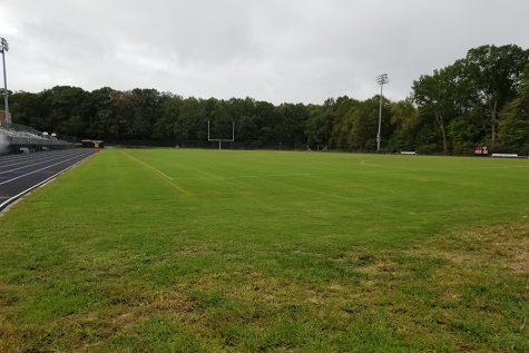 Bermuda Grass Field Once Flooded, Now Drying For Mid-Season