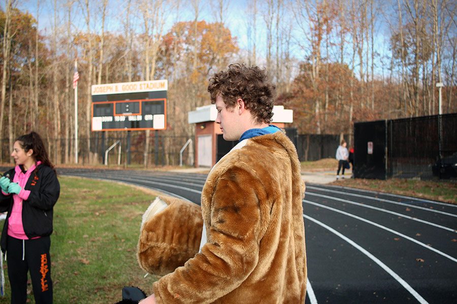 Senior staff writer Teddy Bilodeau wore the Rammy costume and congratulated runners as they crossed the finish line.