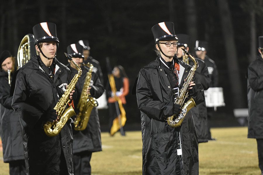 Members of the marching band perform during halftime at the varsity football senior night game against Richard Montgomery High School Oct. 26. 