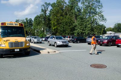 Security directs buses after school in the main parking lot.  Recently, MCPS reached out to county officials discussing ways to increase student and bus safety.