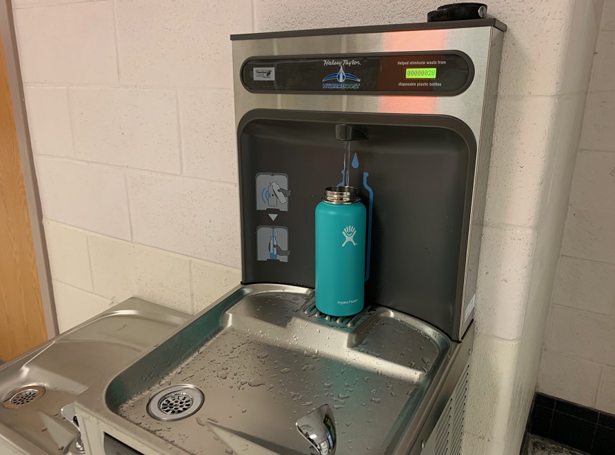 Students have started using the easy-fill water stations to fill up water bottles.  The counter in the top-right corner displays the number of plastic bottles saved by using the water station.  The three new stations were installed in the first week of March.  