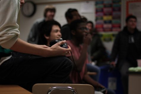 Studnets look on at players during the National Honor Society's Super Smash Bros. tournament March 4-7.