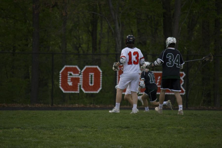 Senior Attack Aidan Kalinock looking to receive a pass in this middle of the Damascus defense

