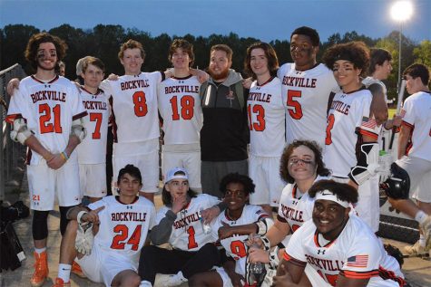 Varsity lacrosse head coach Jesse Rutter ('06) (center) initially coached varsity football but then moved to lacrosse which he played at RHS.