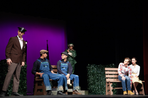A scene in which the sheriff (Patrick Gallagher) finds two circus boys (Carlos Escobar and Tomar Atzili) and suspects them of committing robberies nearby.
