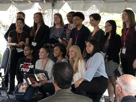 Each of the 13 Fitzgerald Scholars pose with their awards from the festival, which took place Oct. 12 at the Glenview Mansion.