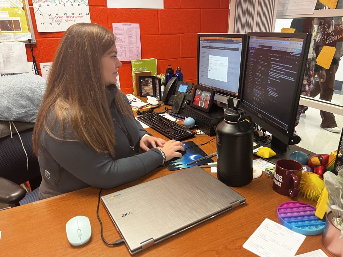 College and Career Information Coordinator Victoria Wolk works at her desk in the College and Career Center.  Wolk intends to utilize the Center to help every student at Rockville create a postsecondary plan. “I want students to be excited about the college process,” Wolk said.